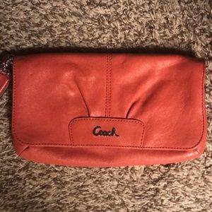 Coach Clutch salmon color
